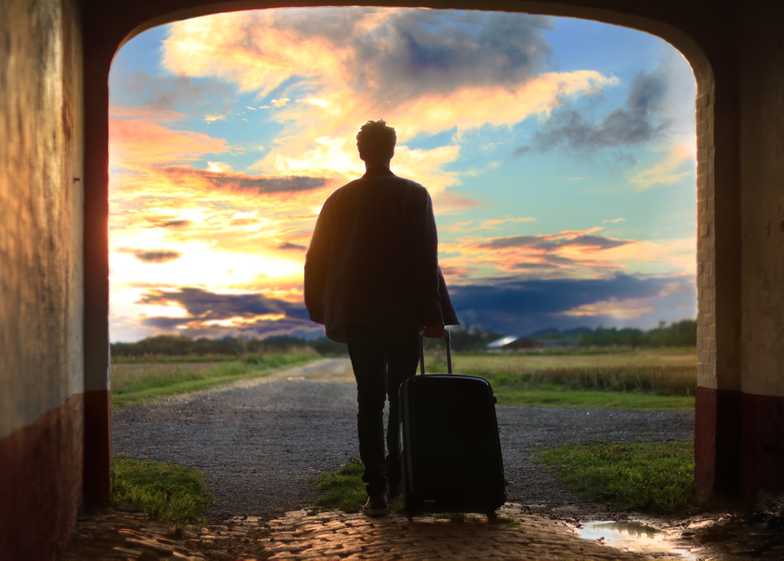 Man leaving with suitcase